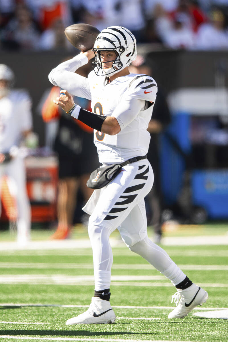 Cincinnati Bengals quarterback Joe Burrow (9) throws a pass during an NFL football game against ...