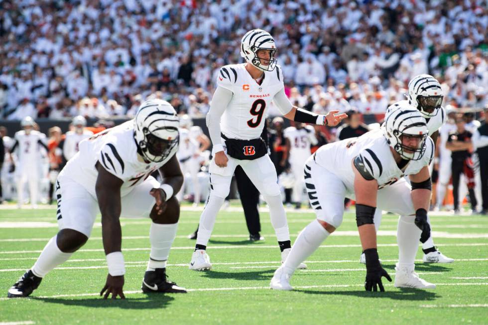 Cincinnati Bengals quarterback Joe Burrow (9) calls a play during an NFL football game against ...