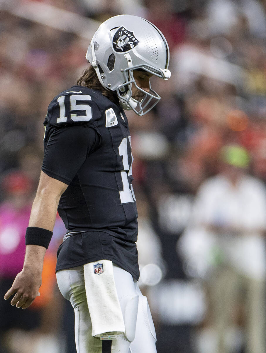 Raiders quarterback Gardner Minshew (15) walks back a couple of yards after a play during the s ...