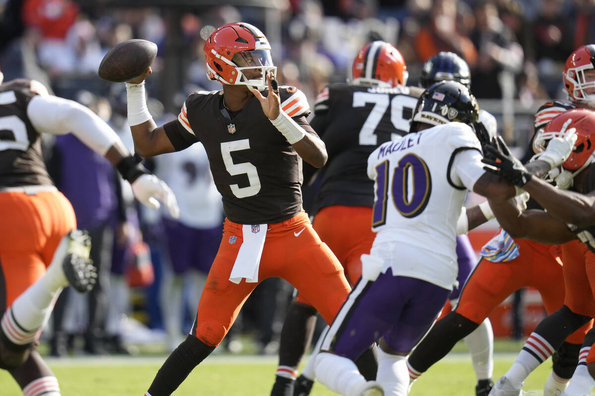 Cleveland Browns quarterback Jameis Winston (5) throws in the second half of an NFL football ga ...