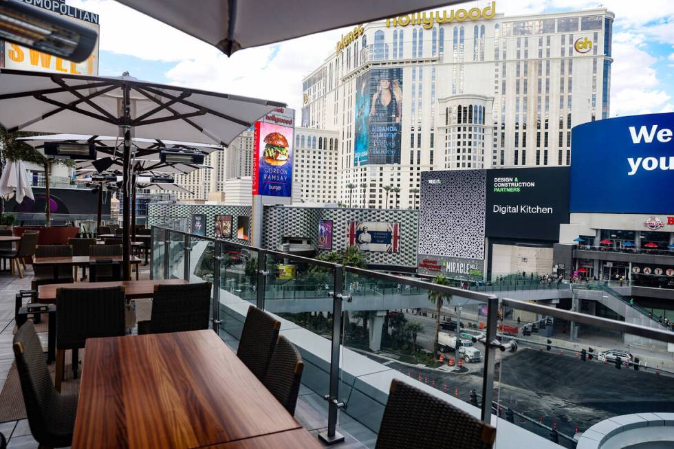 The terrace at Ocean Prime overlooks the Las Vegas Strip. The restaurant is hosting food and dr ...