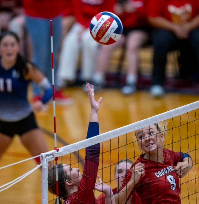 Coronado's Rachel Schwartz (10) attempts a return back to Bishop Gorman with teammate Rachel Pu ...