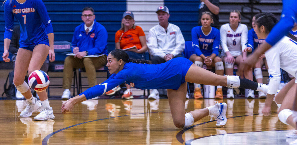 Bishop Gorman's Ayanna Watson (8) digs out a serve against Coronado during the third set of the ...