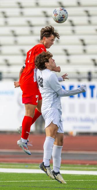 Coronado forward Austin Kiernan (7) heads the ball against Palo Verde midfielder Trustin Parker ...