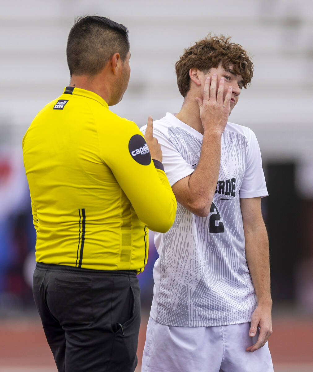 Palo Verde defender Jaxon Law (2) is counseled by the referee after unnecessary contact with a ...