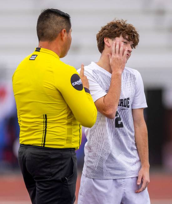 Palo Verde defender Jaxon Law (2) is counseled by the referee after unnecessary contact with a ...