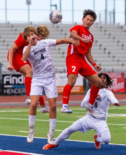 Coronado forward Austin Kiernan (7) heads the ball towards the goal past Palo Verde forward Luk ...