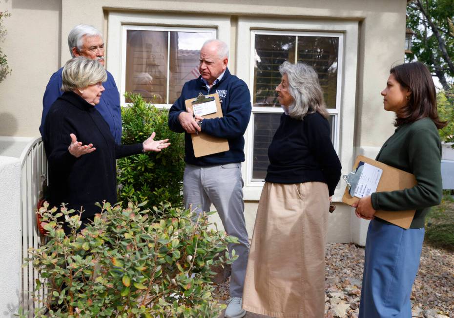 Democratic vice presidential nominee Tim Walz, center, and Rep. Dina Titus, D-Nev., second righ ...