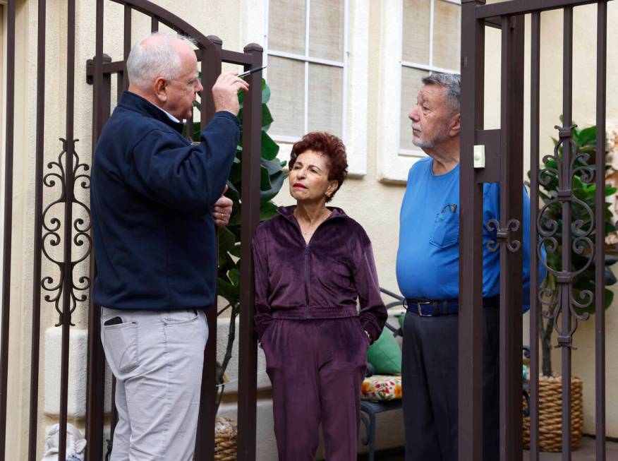 Democratic vice presidential nominee Tim Walz talks to supporters outside the couple's house tw ...