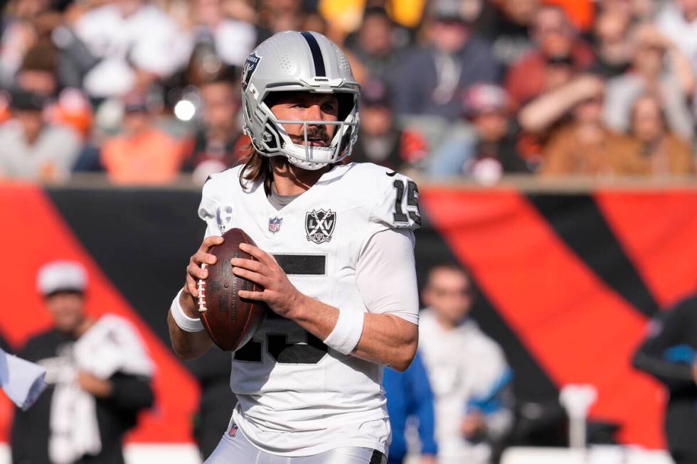 Las Vegas Raiders quarterback Gardner Minshew II (15) drops back to pass against the Cincinnati ...