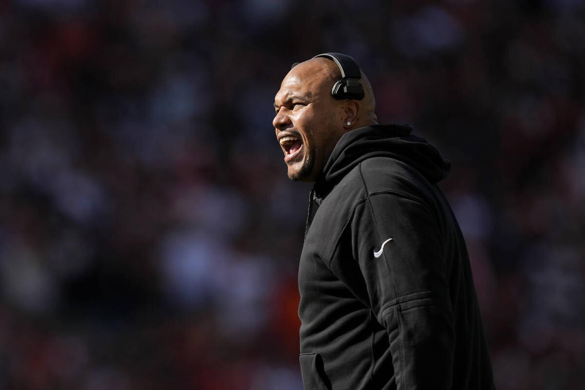 Las Vegas Raiders head coach Antonio Pierce reacts during the first half of an NFL football gam ...