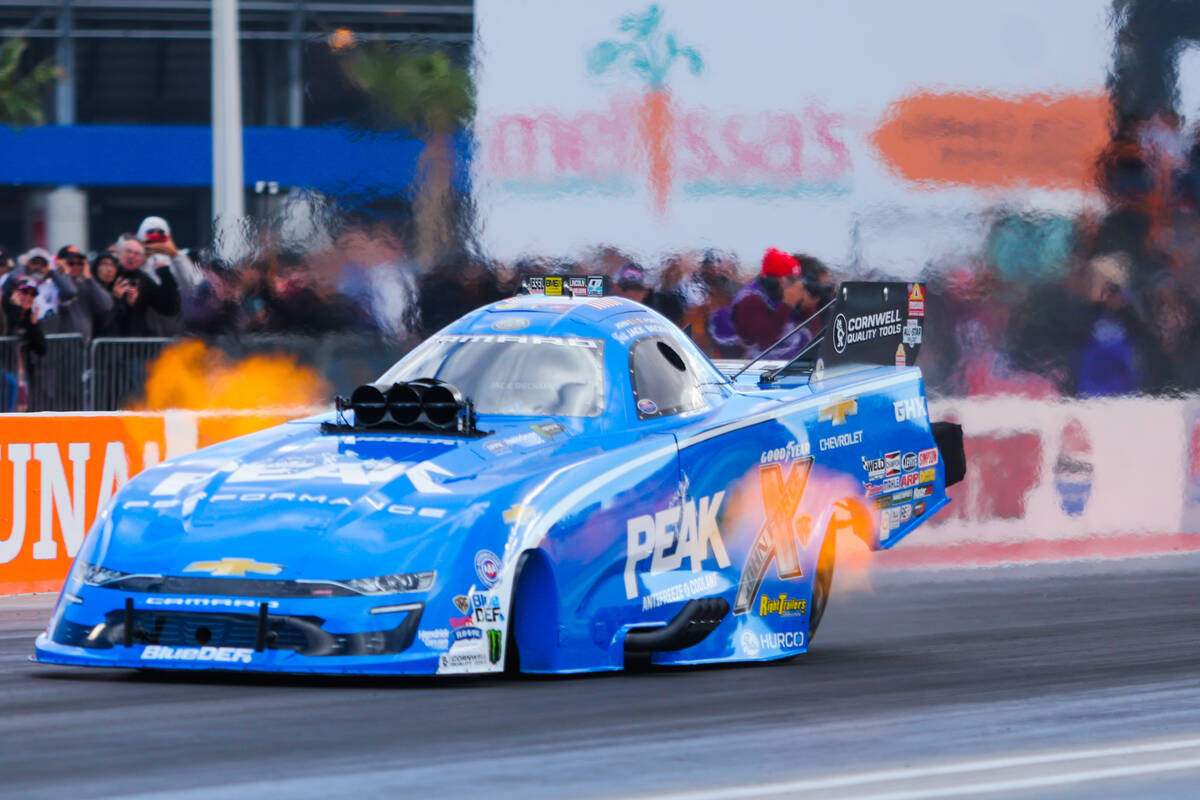 NHRA driver Jack Beckman races in a John Force Racing car during the NHRA Funny Car quarterfina ...