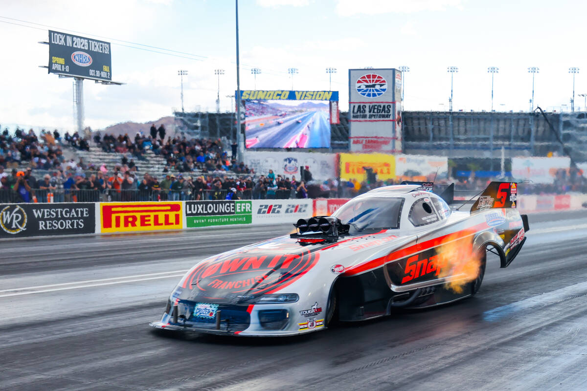 NHRA driver Cruz Pedregon races during the NHRA Funny Car quarterfinals at the Las Vegas Motor ...