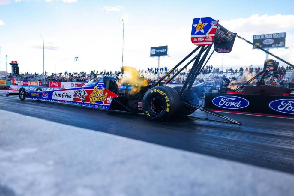 NHRA driver Clay Millican takes off during the NHRA Top Fuel semifinals at the Las Vegas M ...