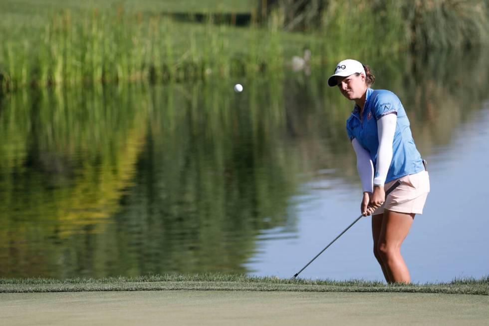 Ally Ewing chips onto the 18th hole during the quarter final round of the Bank of Hope LPGA Ma ...