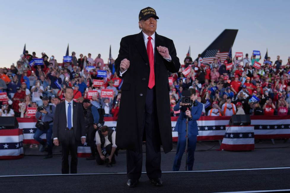 Republican presidential nominee former President Donald Trump dances at a campaign rally at Kin ...