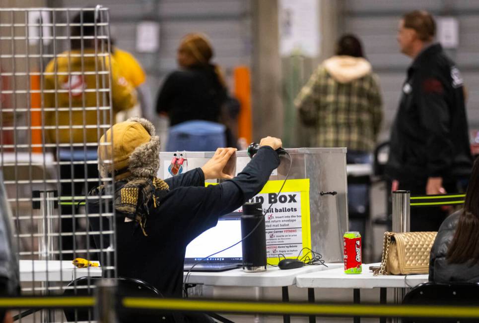 A ballot drop box is scanned in at the Clark County Election Department warehouse on Tuesday, N ...