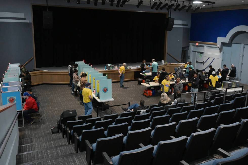 Voters cast their ballots at the Winchester Dondero Cultural Center Tuesday, November 5, 2024, ...