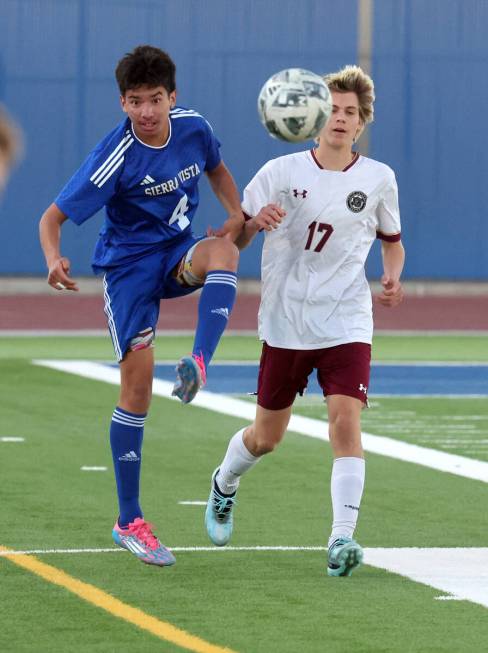 Sierra Vista midfielder Jacob Perez (4) passes the ball in front of Faith Lutheran forward Toho ...