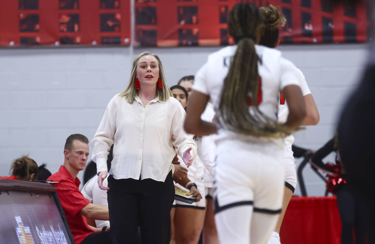 UNLV Lady Rebels head coach Lindy La Rocque talks with her players during the first half of a b ...