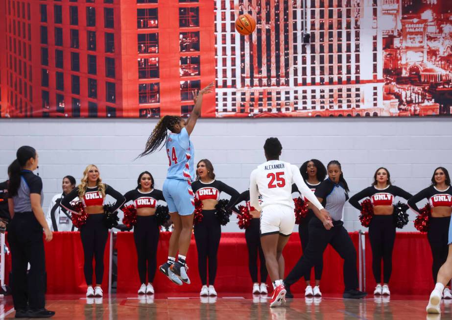 Loyola Marymount Lions guard Zawadi Ogot (54) shoots over UNLV Lady Rebels guard Aaliyah Alexan ...