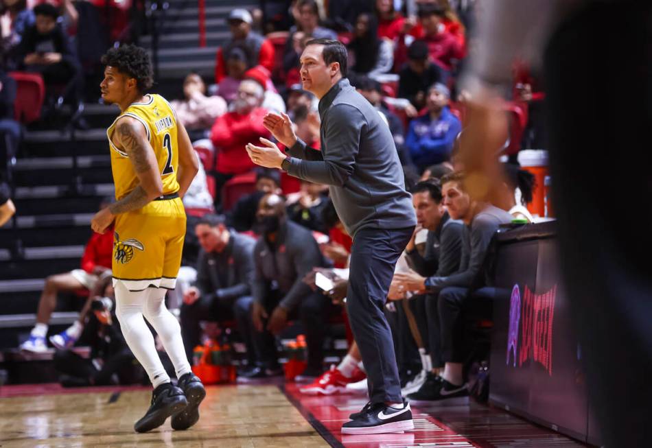 UNLV Rebels head coach Kevin Kruger directs his team during the first half of a basketball game ...