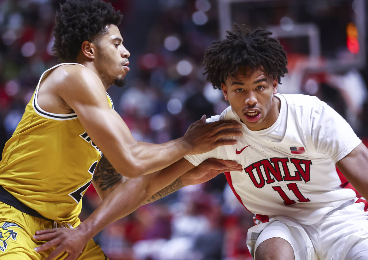 UNLV Rebels guard Dedan Thomas Jr. (11) drives the ball against Alabama State Hornets guard Mic ...