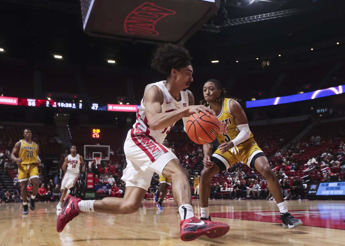 UNLV Rebels guard Brooklyn Hicks (13) drives to the basket against Alabama State Hornets guard ...