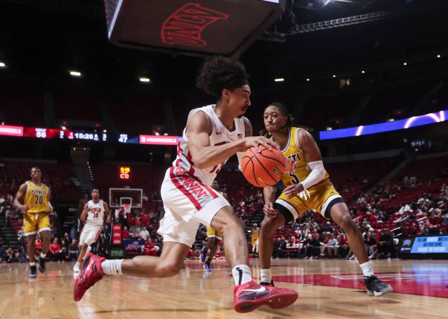 UNLV Rebels guard Brooklyn Hicks (13) drives to the basket against Alabama State Hornets guard ...