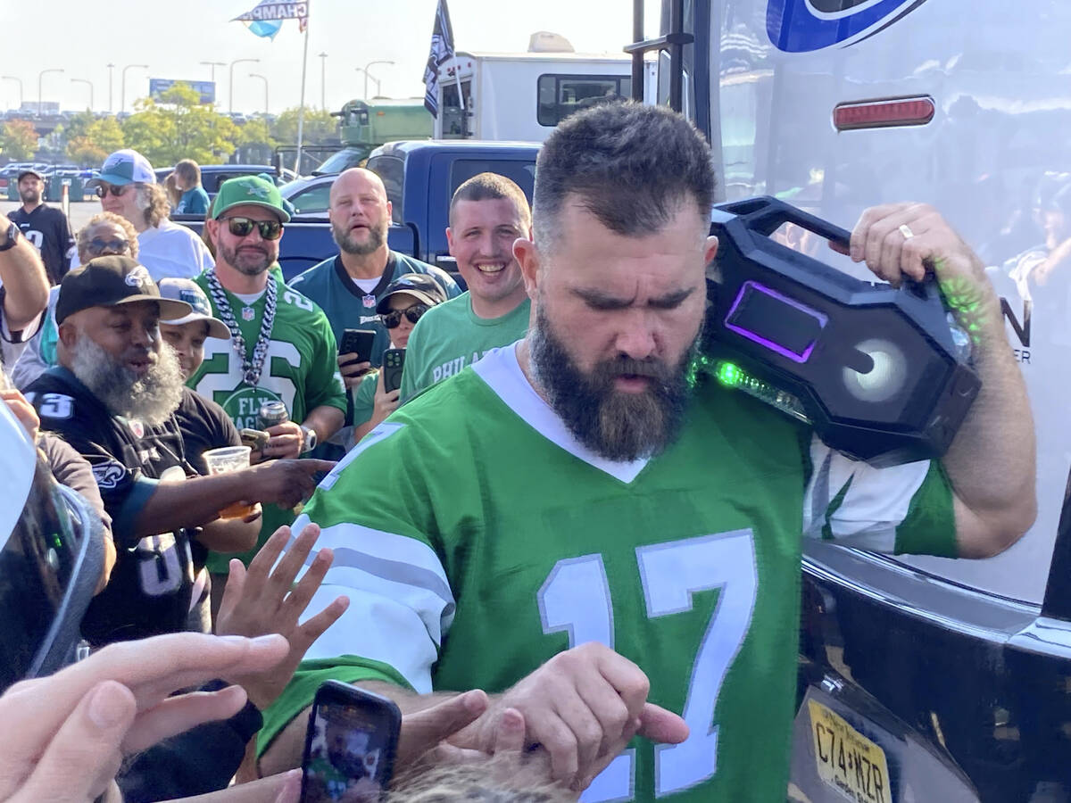 Retired Philadelphia Eagles center Jason Kelce greets fans at an impromptu appearance at a preg ...