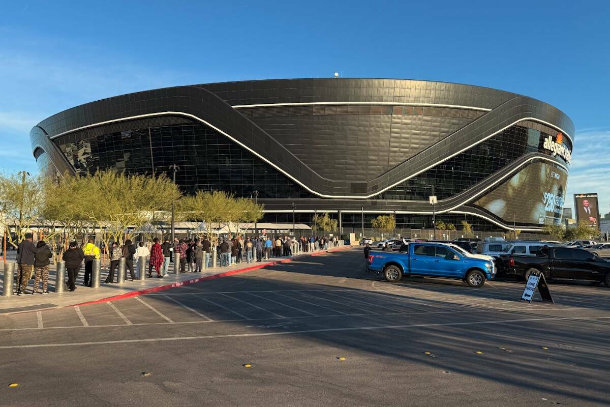 Election Day voters lineup at Allegiant Stadium in Las Vegas on Tuesday, Nov. 5, 2024. (Kevin C ...