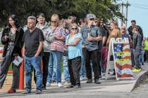 Nye County residents wait in line at the Bob Ruud community center where roughly 1,000 voters h ...