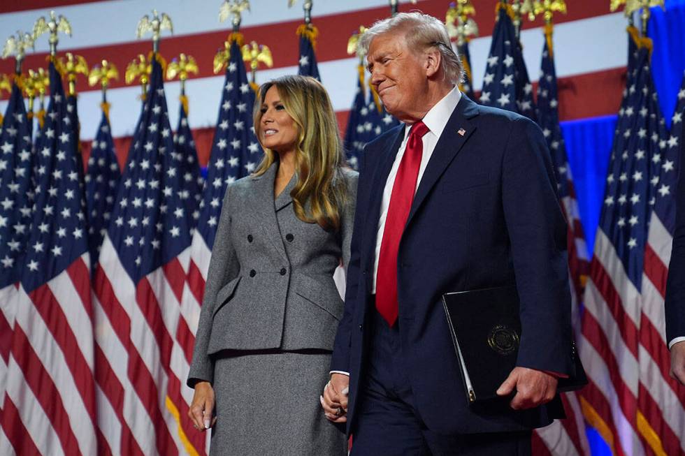 Republican presidential nominee former President Donald Trump stands with former first lady Mel ...