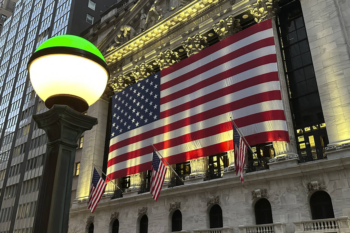 The American flags hangs on the facade of the New York Stock Exchange in New York's Financial D ...