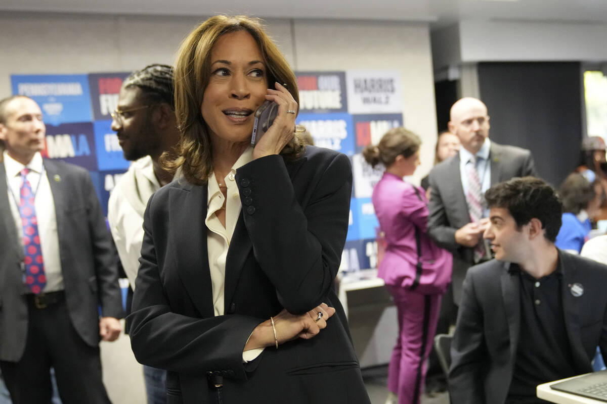 Democratic presidential nominee Vice President Kamala Harris phone banks with volunteers at the ...