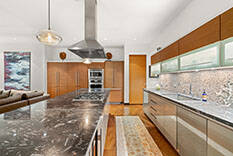 The kitchen features upgraded appliances. (Berkshire Hathaway Home Services)