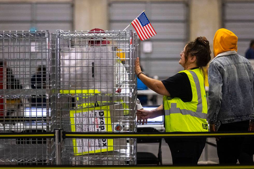 Ballot drop boxes are processed at the Clark County Election Department warehouse on Tuesday, N ...