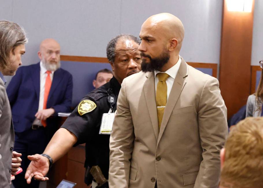 Metropolitan Police Department Sgt. Kevin Menon leaves a courtroom after his bail hearing at th ...