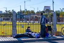 Homeless campers claim spots on the sidewalk along Owens Avenue on Wednesday, Nov. 6, 2024, in ...