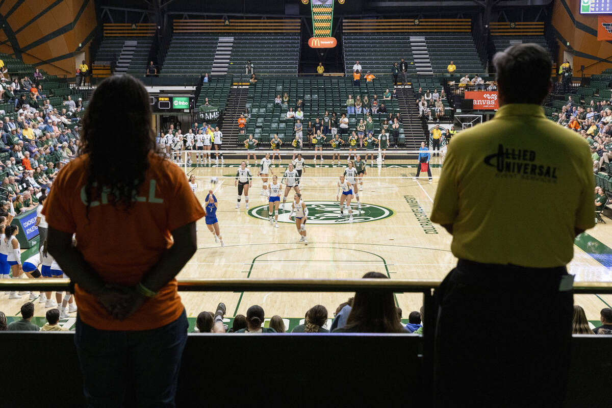 Workers monitor the NCAA Mountain West women's volleyball game between the Colorado State Unive ...