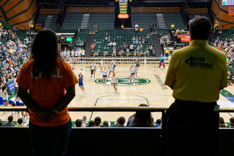 Workers monitor the NCAA Mountain West women's volleyball game between the Colorado State Unive ...