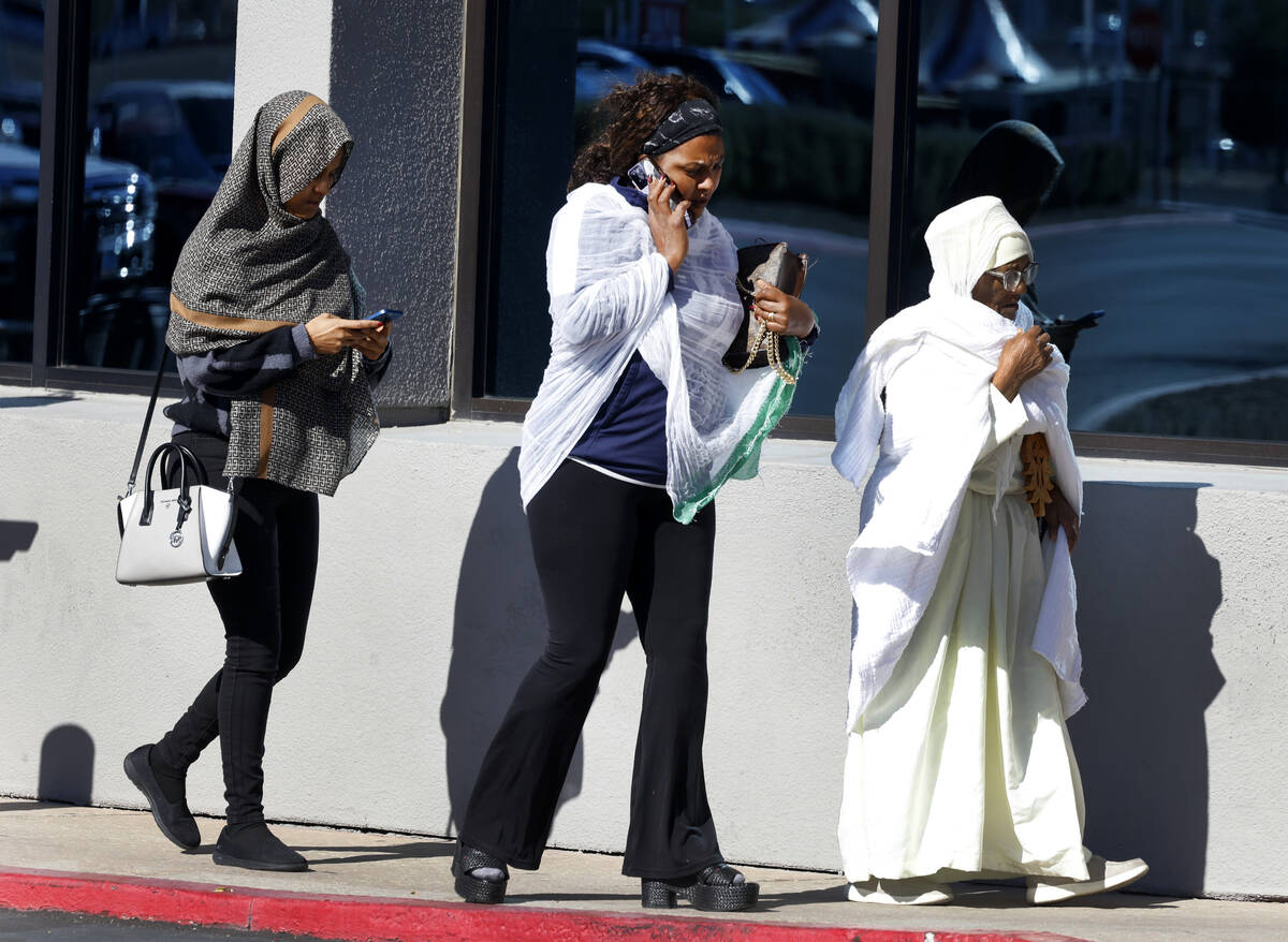 Mourners arrive at Central Church to attend a funeral service on Thursday, Nov. 7, 2024, in Hen ...