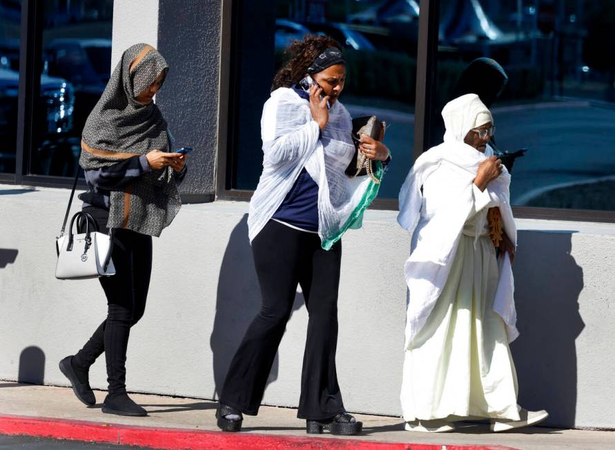 Mourners arrive at Central Church to attend a funeral service on Thursday, Nov. 7, 2024, in Hen ...