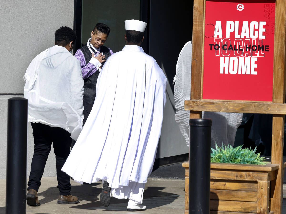 Mourners arrive at Central Church to attend a funeral service on Thursday, Nov. 7, 2024, in Hen ...