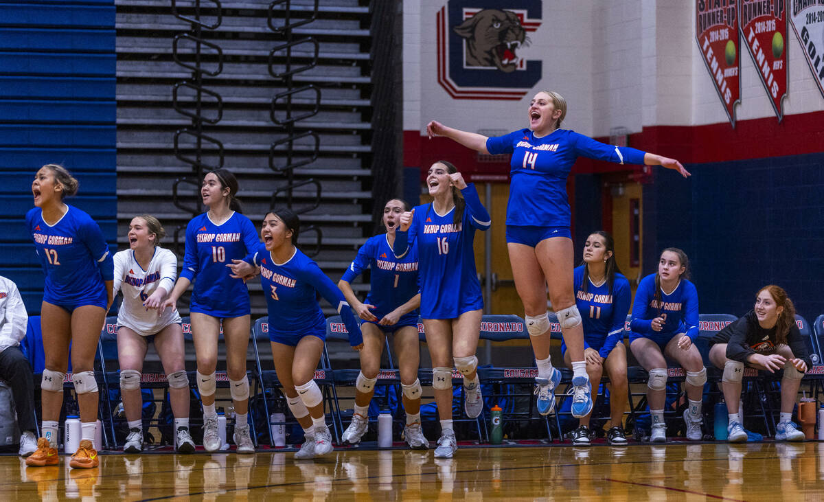 Bishop Gorman players erupt on the bench as the final point is won against Coronado in their Cl ...