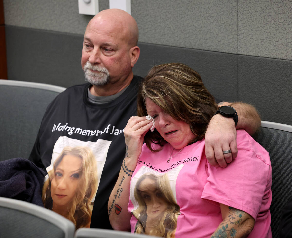 Wendy Calorusso, mother of murder victim Janell Bowen, wipes tears with husband Chris Calorusso ...