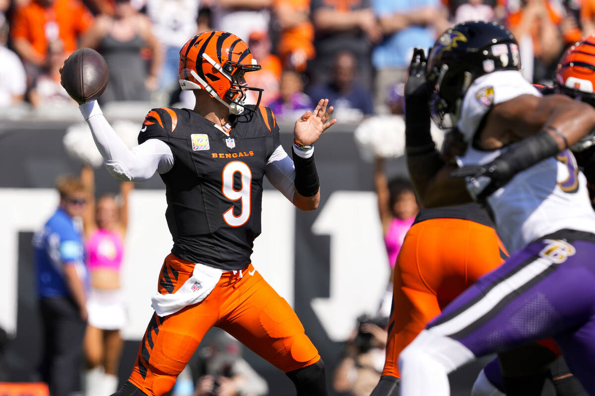 Cincinnati Bengals quarterback Joe Burrow (9) throws during an NFL football game against the Ba ...