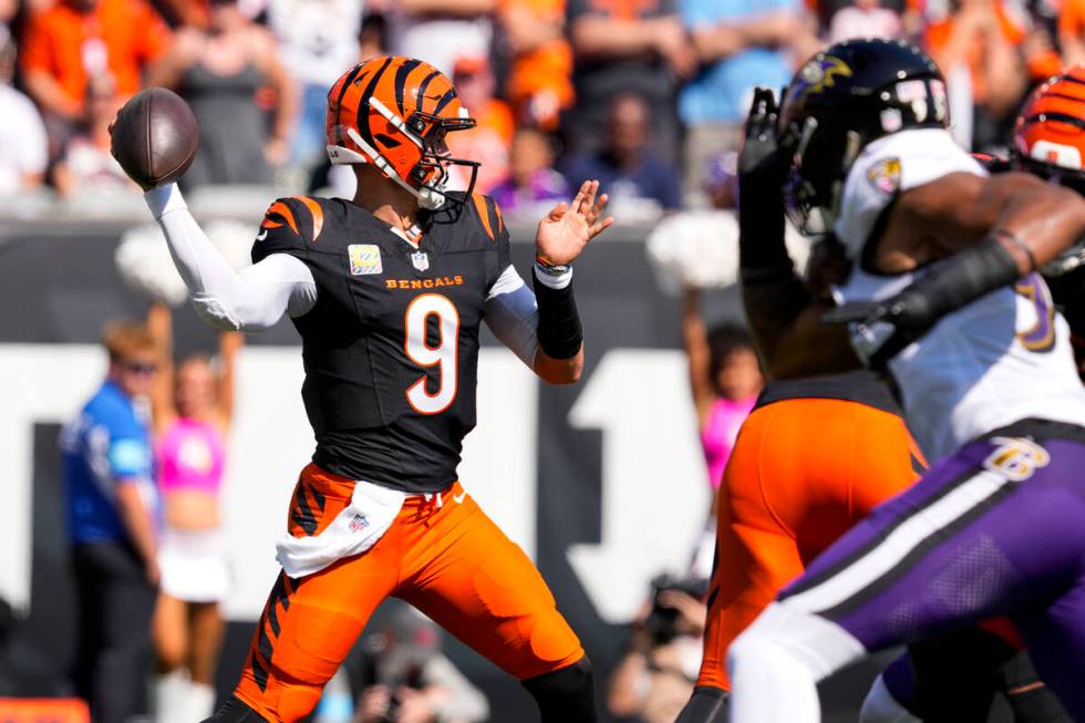 Cincinnati Bengals quarterback Joe Burrow (9) throws during an NFL football game against the Ba ...