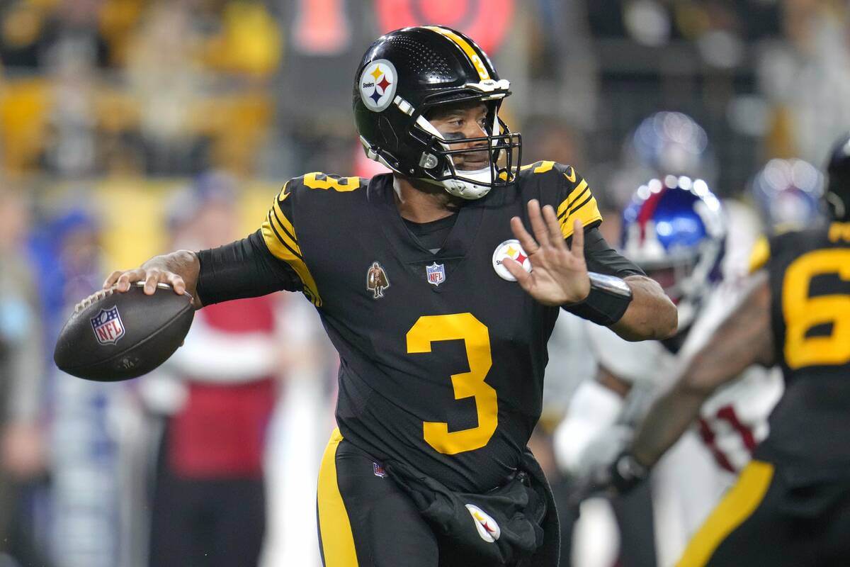 Pittsburgh Steelers quarterback Russell Wilson (3) looks to throw a pass during the first half ...