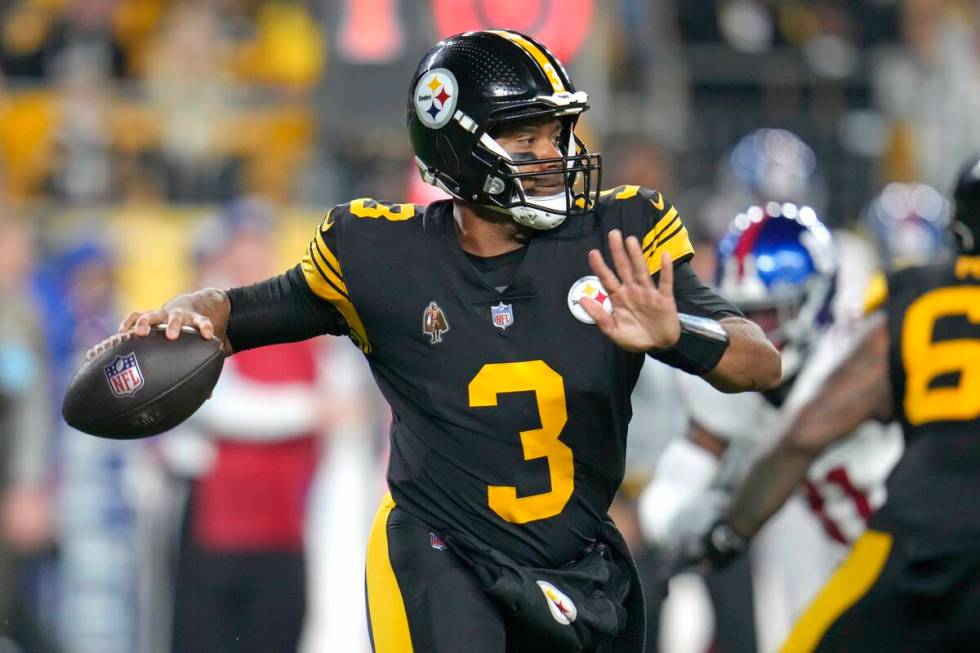 Pittsburgh Steelers quarterback Russell Wilson (3) looks to throw a pass during the first half ...